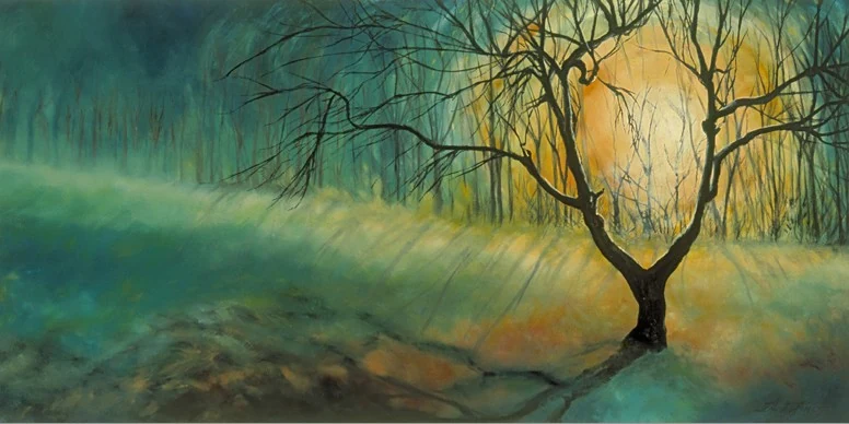 A bare tree stands before a green and golden glow, casting a long shadow.