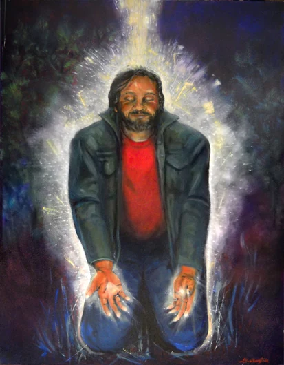 A kneeling man in a red shirt opens his hands as white light surrounds him and streams down from above.